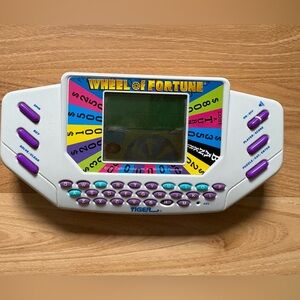 Vintage 90s Tiger Wheel of Fortune Electronic Game - White and Purple